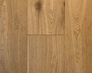 Close-up of light oak flooring showing grain, texture, and subtle color variations.