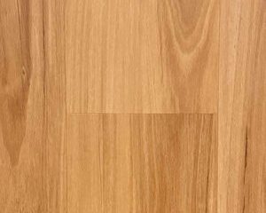 Close-up of light brown hardwood flooring with a smooth finish and subtle grain patterns.